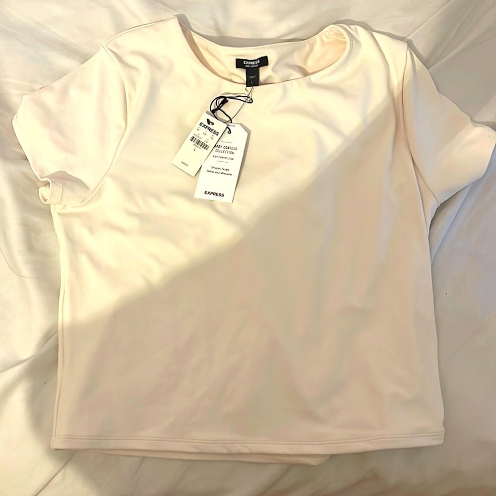 Express off white shirt. Perfect for a hot summer day!